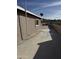 Backyard patio with concrete flooring and tile detail at 469 W Newmont St, Superior, AZ 85173