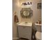 Small bathroom with vanity and decorative mirror at 469 W Newmont St, Superior, AZ 85173