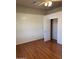 Bedroom with hardwood floors and spacious closet at 469 W Newmont St, Superior, AZ 85173