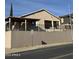 House exterior with a covered patio and fence at 469 W Newmont St, Superior, AZ 85173