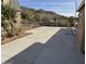 Large side yard with concrete patio and mountain views at 469 W Newmont St, Superior, AZ 85173