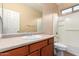 Bathroom with single sink vanity and bathtub at 4723 W Gelding Dr, Glendale, AZ 85306