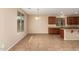 Bright dining area with tile floor and wood cabinets at 4723 W Gelding Dr, Glendale, AZ 85306