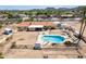 Aerial view of a home with a pool and a large backyard at 4832 W Saguaro Park Ln, Glendale, AZ 85310