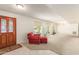 Bright entryway with tiled floors and a view into the living room at 4832 W Saguaro Park Ln, Glendale, AZ 85310