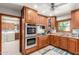 Kitchen with stainless steel appliances and double oven at 4832 W Saguaro Park Ln, Glendale, AZ 85310