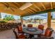 Relaxing patio area with seating and pool views at 4832 W Saguaro Park Ln, Glendale, AZ 85310