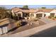 Single-story home with solar panels and desert landscaping at 4914 W Comanche Dr, Eloy, AZ 85131