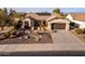 Single-story home with solar panels and desert landscaping at 4914 W Comanche Dr, Eloy, AZ 85131