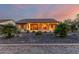 Landscaped backyard featuring desert plants and gravel, creating a low-maintenance outdoor space at 4914 W Comanche Dr, Eloy, AZ 85131