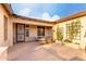 Bright courtyard with seating area and planters at 4914 W Comanche Dr, Eloy, AZ 85131