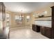 Bright dining area with built-in cabinetry and large windows at 4914 W Comanche Dr, Eloy, AZ 85131