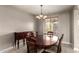 Formal dining room with a wood table and chair set at 4914 W Comanche Dr, Eloy, AZ 85131