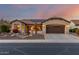 House exterior at dusk with landscaping at 4914 W Comanche Dr, Eloy, AZ 85131