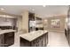 Kitchen island with granite countertops and stainless steel appliances at 4914 W Comanche Dr, Eloy, AZ 85131