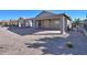 Landscaped backyard with gravel and desert plants at 498 N Santiago Trl, Casa Grande, AZ 85194