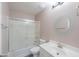 Clean bathroom with a shower/tub, vanity, and a circular mirror at 498 N Santiago Trl, Casa Grande, AZ 85194