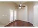 Dining area with wood floors and French doors at 498 N Santiago Trl, Casa Grande, AZ 85194