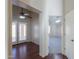 Hallway with wood floors and access to bedroom at 498 N Santiago Trl, Casa Grande, AZ 85194