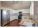 Kitchen with white cabinets, granite counters, and stainless steel appliances at 498 N Santiago Trl, Casa Grande, AZ 85194