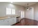 Kitchen with white cabinets, granite counters, and stainless steel appliances at 498 N Santiago Trl, Casa Grande, AZ 85194