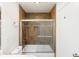 Updated bathroom with shower/tub combo and tile surround at 602 N May St # 47, Mesa, AZ 85201