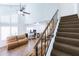 View of carpeted stairs leading to the upper level from the living room at 602 N May St # 47, Mesa, AZ 85201