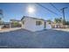 Newly renovated single story home with a modern facade and gated front yard at 6323 N 65Th Dr, Glendale, AZ 85301