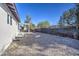 Side view of home showcasing backyard and fence at 6323 N 65Th Dr, Glendale, AZ 85301