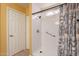 Walk-in shower with grab bar and linen closet at 6340 W Ironwood Dr, Glendale, AZ 85302