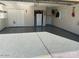 Clean and spacious garage with epoxy flooring at 6340 W Ironwood Dr, Glendale, AZ 85302