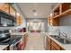 Eat-in kitchen with a bay window and ample counter space at 6340 W Ironwood Dr, Glendale, AZ 85302