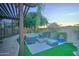 Relaxing backyard oasis with fire pit and seating area at 6502 N 81St Pl, Scottsdale, AZ 85250