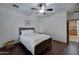 Cozy bedroom with a queen-size bed and access to a bathroom at 6502 N 81St Pl, Scottsdale, AZ 85250