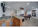 Wet bar with granite countertop and sink in game room at 6502 N 81St Pl, Scottsdale, AZ 85250