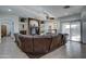 Relaxing living room boasts a large sectional sofa and a fireplace at 6502 N 81St Pl, Scottsdale, AZ 85250