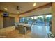 Covered patio with a dining table and view of the pool at 6502 N 81St Pl, Scottsdale, AZ 85250