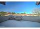 Private patio with wicker furniture offering scenic views at 6502 N 81St Pl, Scottsdale, AZ 85250