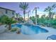 Inviting swimming pool with a waterfall feature at 6502 N 81St Pl, Scottsdale, AZ 85250