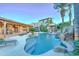 Relaxing swimming pool with a rock waterfall feature at 6502 N 81St Pl, Scottsdale, AZ 85250