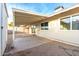 Backyard view of patio and house exterior at 6820 N 81St Ln, Glendale, AZ 85303