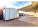 Backyard with storage shed and covered patio at 6820 N 81St Ln, Glendale, AZ 85303