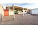 Covered patio with gravel yard and storage shed at 6820 N 81St Ln, Glendale, AZ 85303