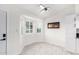 Modern dining area with tile floors and kitchen access at 6820 N 81St Ln, Glendale, AZ 85303