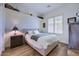 Cozy bedroom featuring wood floors and window shutters at 7257 E Visao Dr, Scottsdale, AZ 85266