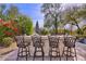 Outdoor kitchen with bar seating and built-in grill at 7257 E Visao Dr, Scottsdale, AZ 85266