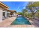 Inviting backyard oasis with a sparkling pool and relaxing patio at 7257 E Visao Dr, Scottsdale, AZ 85266