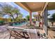 Relaxing pool area with covered patio and seating at 7257 E Visao Dr, Scottsdale, AZ 85266