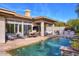 Stunning pool area with outdoor dining and lounge furniture at 7257 E Visao Dr, Scottsdale, AZ 85266