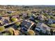 Aerial view of a house with a pool in a luxury community at 7920 E Sierra Morena E Cir, Mesa, AZ 85207